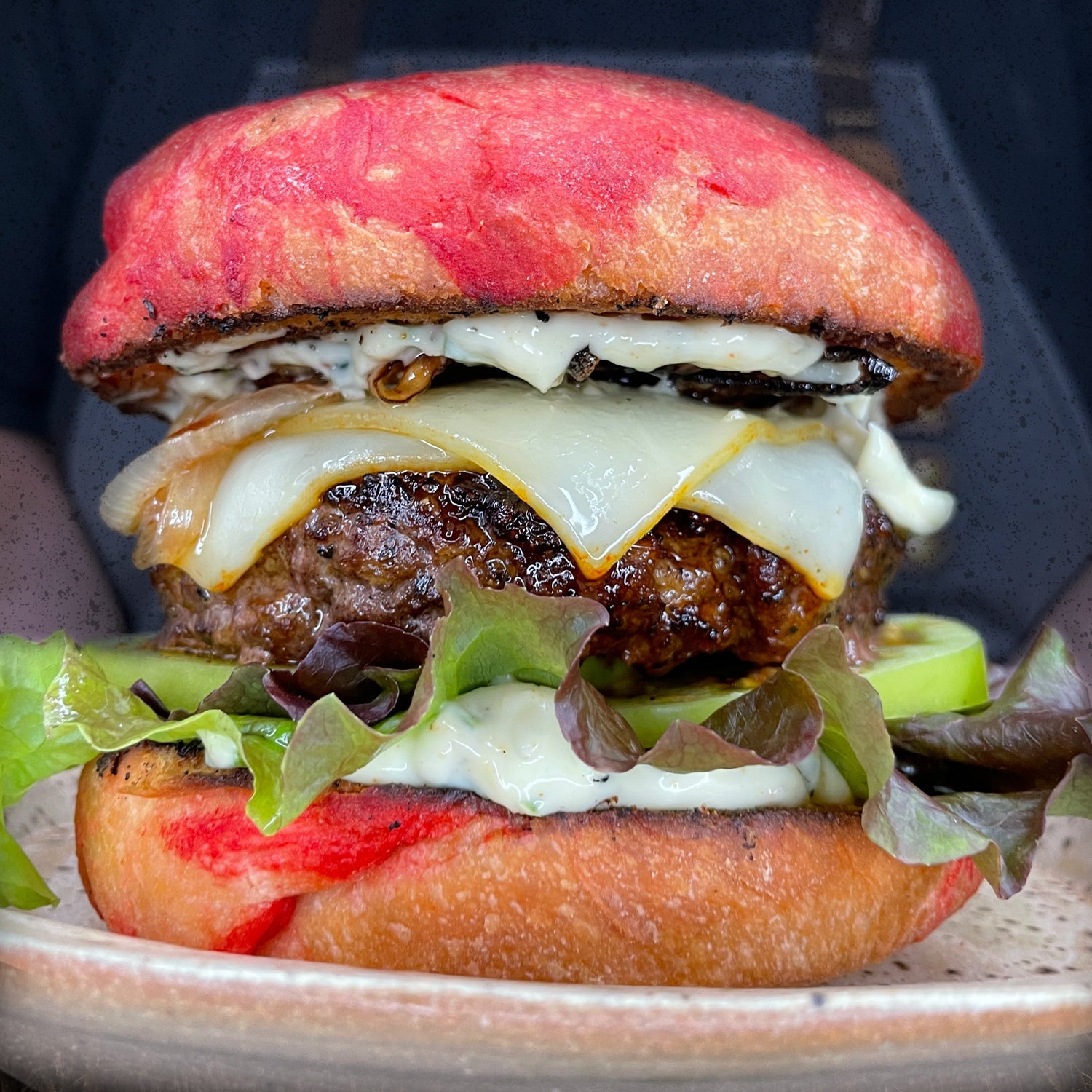 blackened burger or blackened cheeseburger or muenster cheeseburger