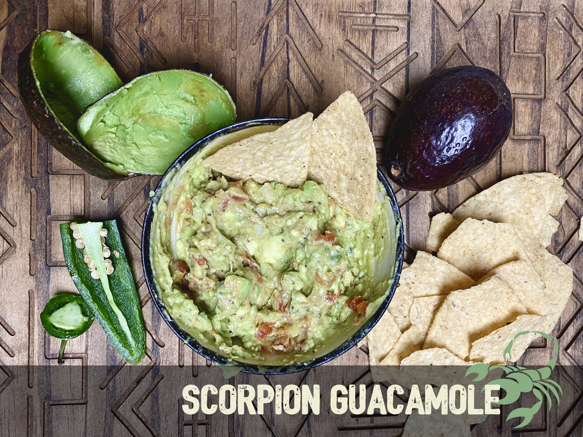 Scorpion guacamole on cutting board