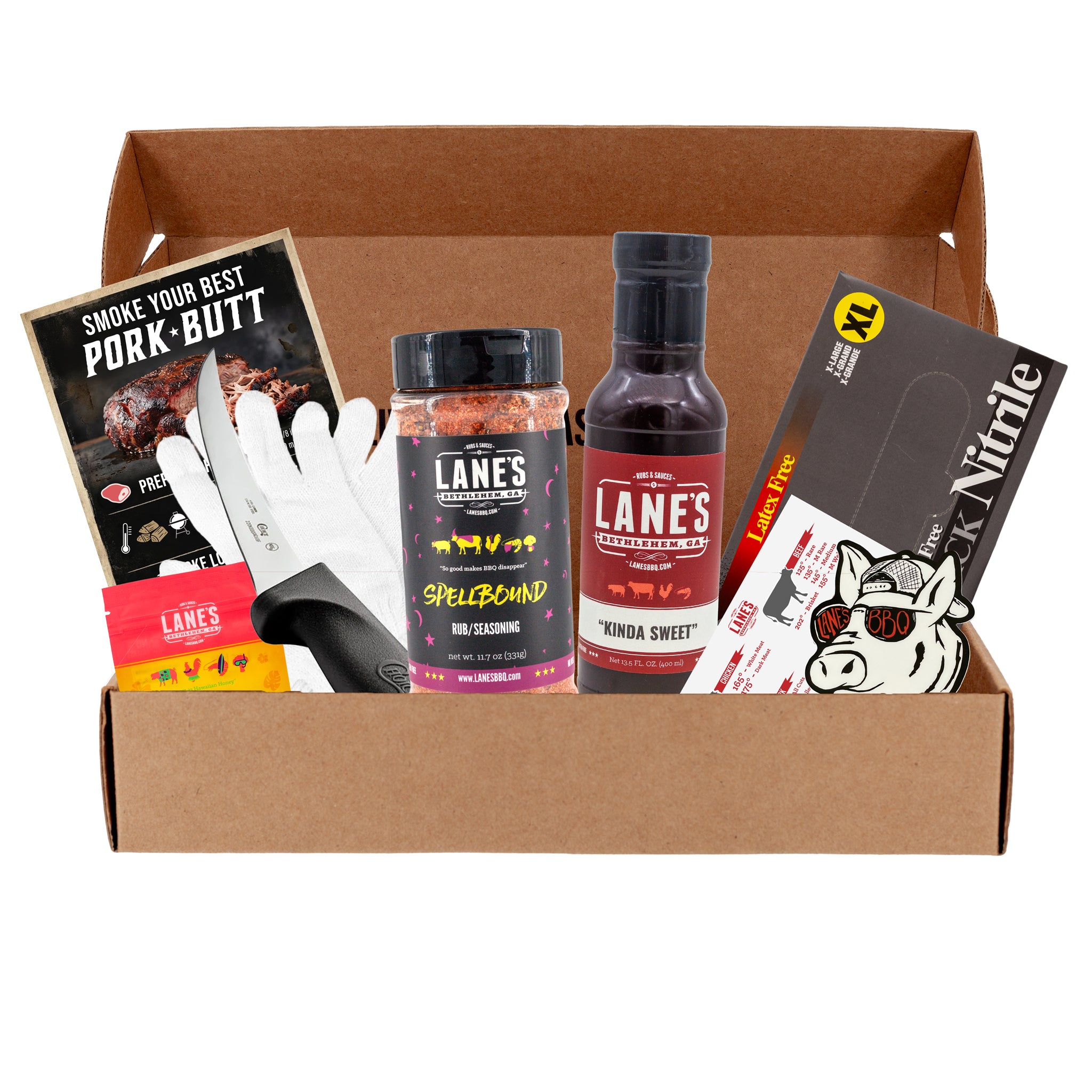 Box containing Lanes BBQ products including seasoning packets, bottles, and a knife.