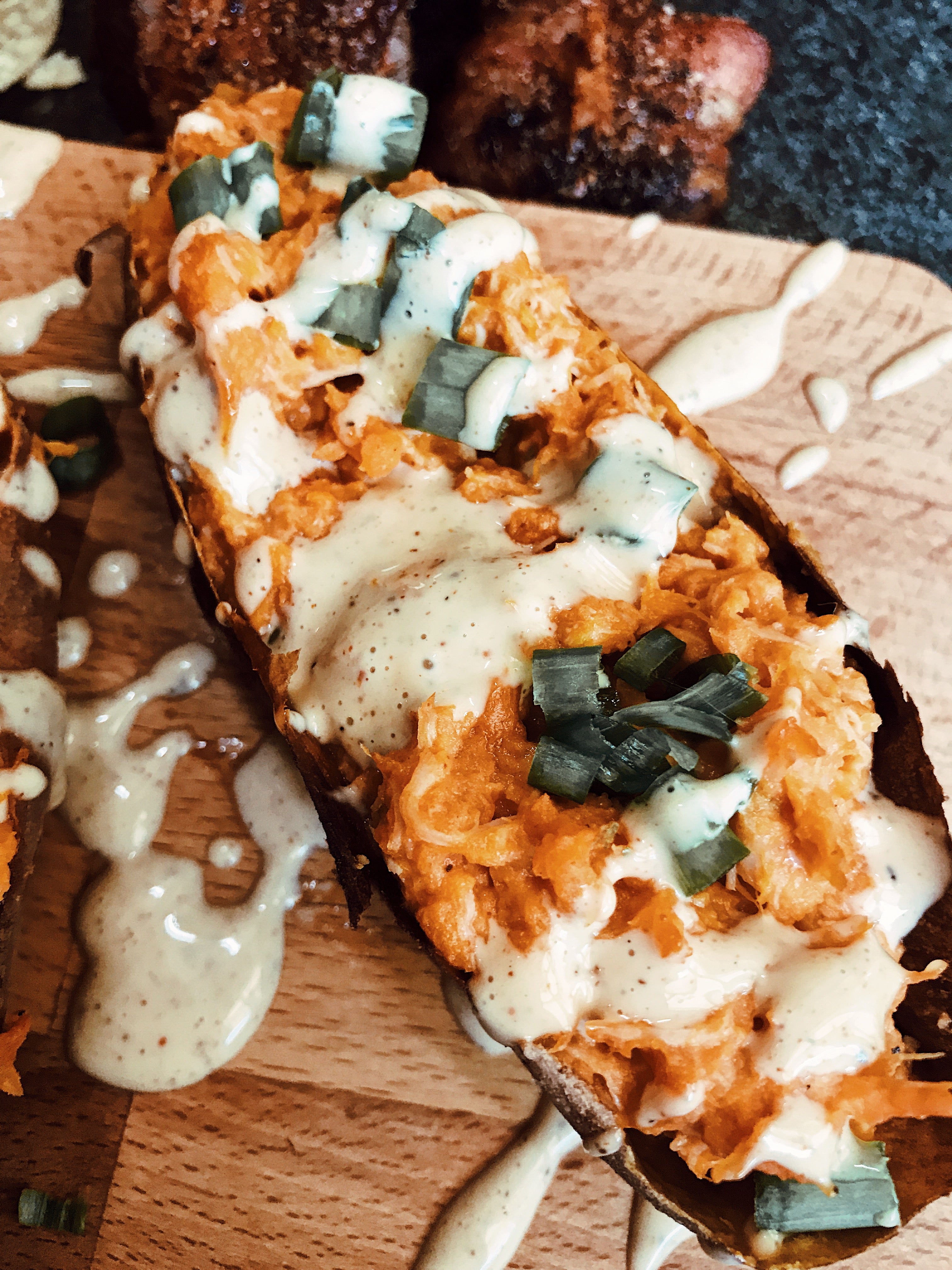 Sweet potato stuffed with buffalo chicken mix