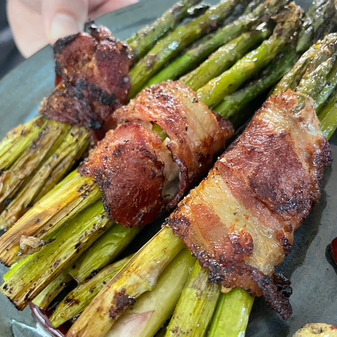 Cooked bacon wrapped asparagus