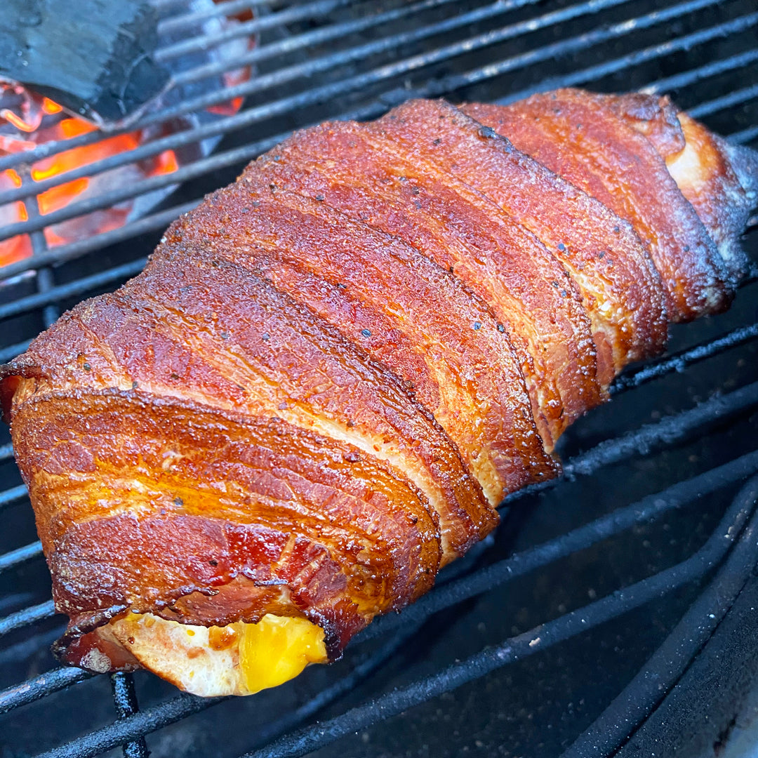 Bacon Wrapped Chicken on the grill
