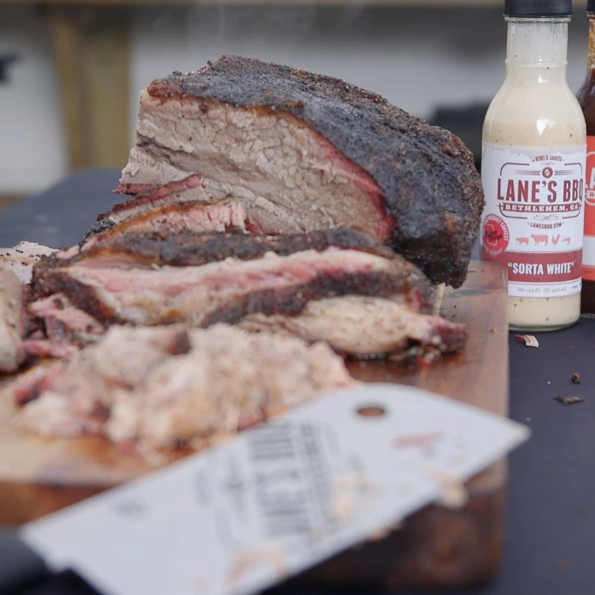 https://lanesbbq.com/cdn/shop/articles/how-to-brisket-guide-main.jpg?crop=center&height=1200&v=1632429971&width=1200